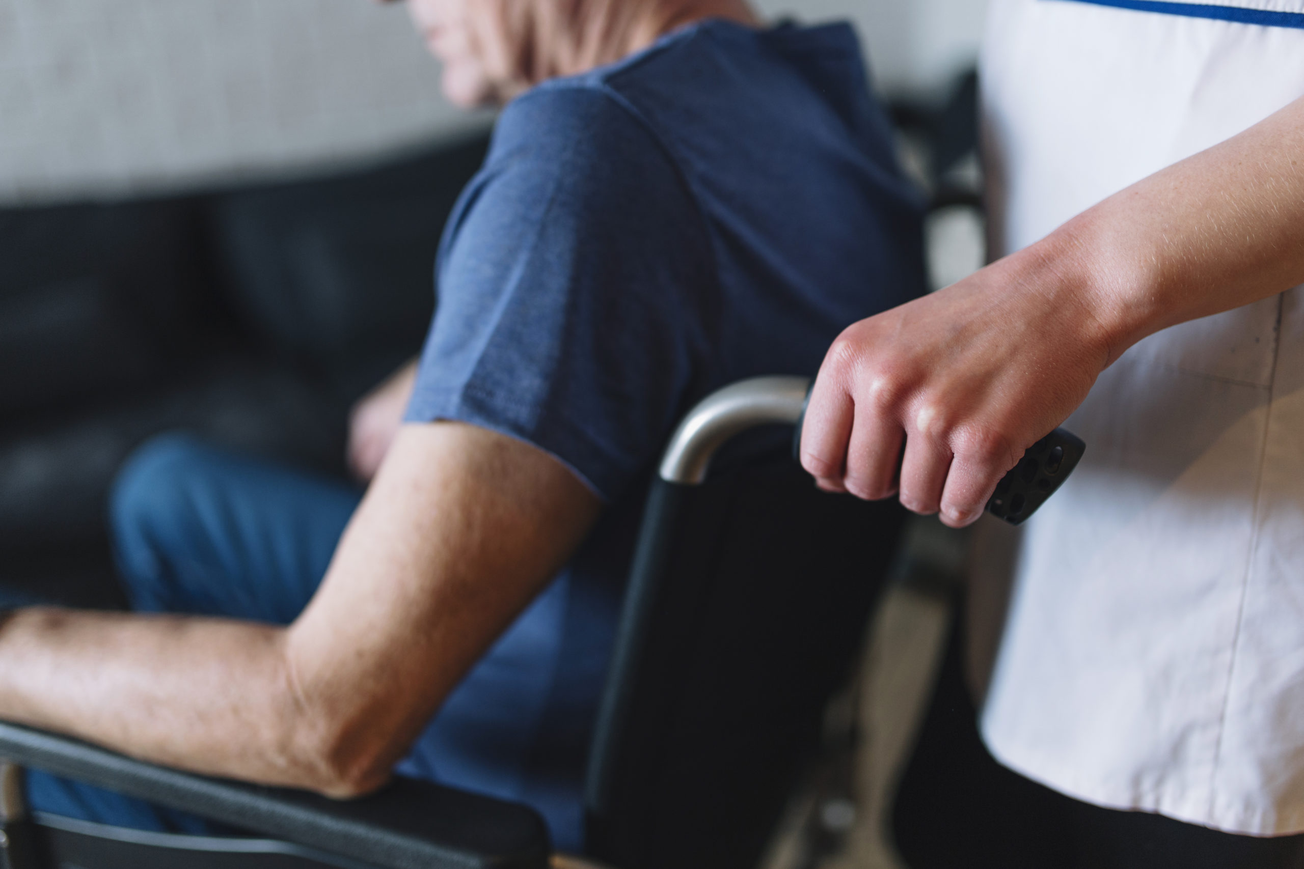 man-in-wheelchair-in-old-age-home
