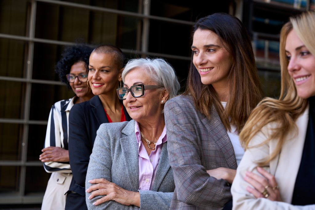 side view group smiling empowered diverse formal 2026 01 07 00 28 15 utc